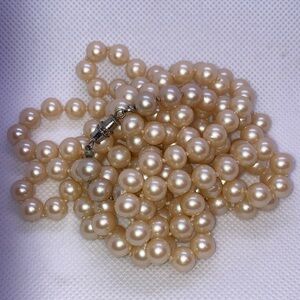Vintage 54 inch single strand of faux pearls - gorgeous color